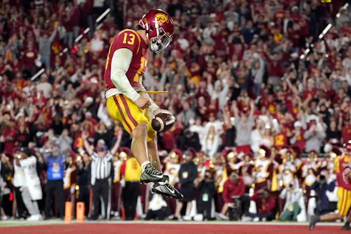 Southern California quarterback Caleb Williams celebrates after running in for a touchdown during the first half of an NCAA college football game against Notre Dame Saturday, Nov. 26, 2022, in Los Angeles.