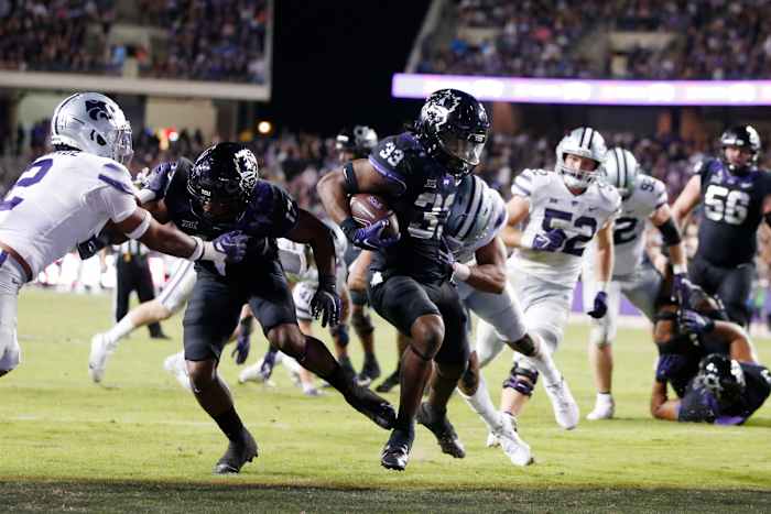 TCU Horned Frogs running back Kendre Miller (33) scores a touchdown against the Kansas State Wildcats