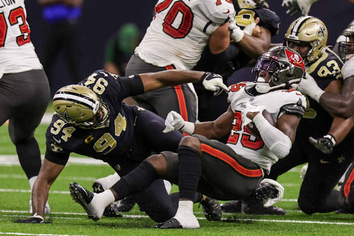 Sep 18, 2022; New Orleans Saints defensive end Cameron Jordan (94) stops Tampa Bay Buccaneers running back Rachaad White (29). Mandatory Credit: Stephen Lew-USA TODAY