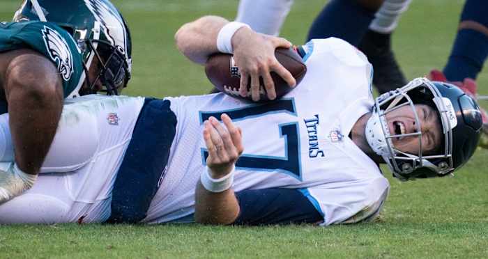 Tennessee Titans quarterback Ryan Tannehill (17) screams as he is sacked by Philadelphia Eagles defensive end Brandon Graham (55) during the third quarter at Lincoln Financial Field Sunday, Dec. 4, 2022, in Philadelphia, Pa.