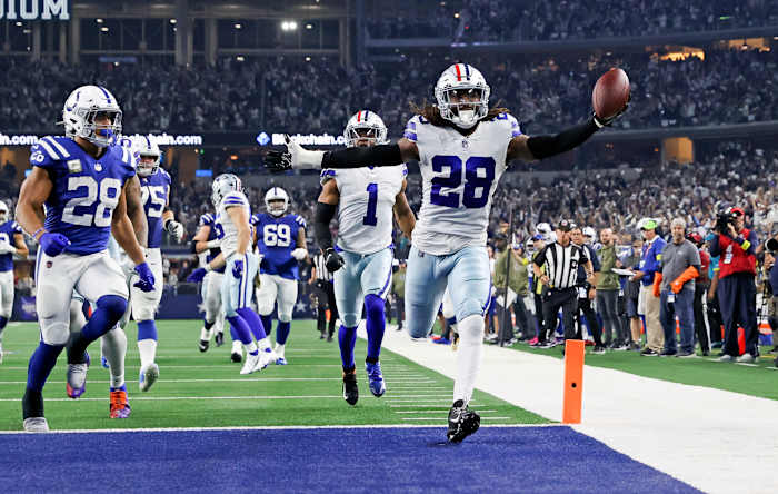 Dec 4, 2022; Arlington, Texas, USA; Dallas Cowboys safety Malik Hooker (28) recovers a fumble and runs it back for a touchdown during the fourth quarter against the Indianapolis Colts at AT&T Stadium.
