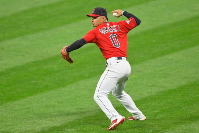 Aug 15, 2022; Cleveland, Ohio, USA; Cleveland Guardians second baseman Andres Gimenez (0) throws to first base in the sixth inning against the Detroit Tigers at Progressive Field. Mandatory Credit: David Richard-USA TODAY Sports