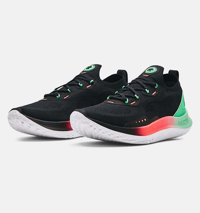 View of black, green, and red Curry Brand running shoes.