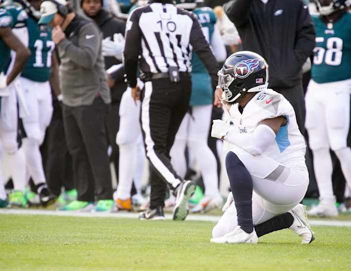Tennessee Titans linebacker David Long Jr. (51) kneels on the ground with an injury during the second quarter at Lincoln Financial Field Sunday, Dec. 4, 2022, in Philadelphia, Pa.