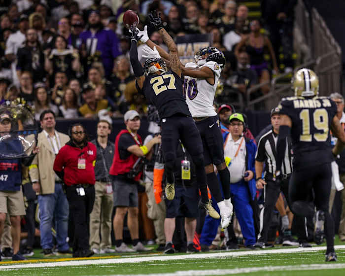 New Orleans Saints cornerback Alontae Taylor (27) breaks up a pass intended for Baltimore Ravens receiver Demarcus Robinson (10). Mandatory Credit: Stephen Lew-USA TODAY Sports