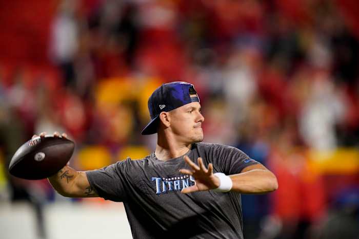 Tennessee Titans quarterback Logan Woodside (5) warms up before facing the Kansas City Chiefs at GEHA Field at Arrowhead Stadium.