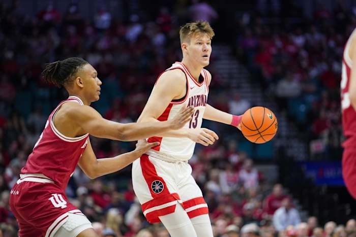 Arizona Wildcats forward Henri Veesaar controls the ball against Indiana Hoosiers forward Malik Reneau during the first half at MGM Grand Garden Arena.