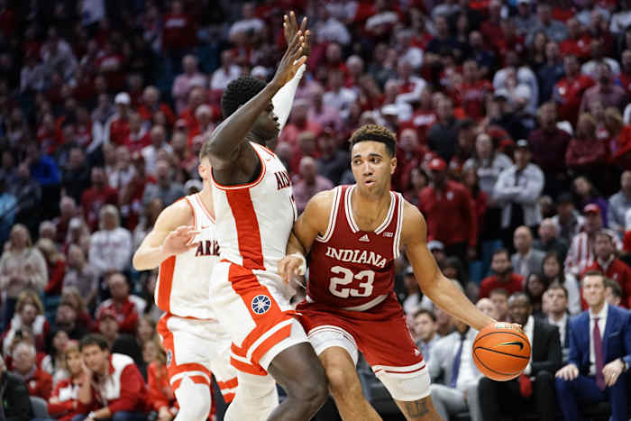 Indiana Hoosiers forward Trayce Jackson-Davis (23) controls the ball against Arizona Wildcats center Oumar Ballo (11) during the second half at MGM Grand Garden Arena.