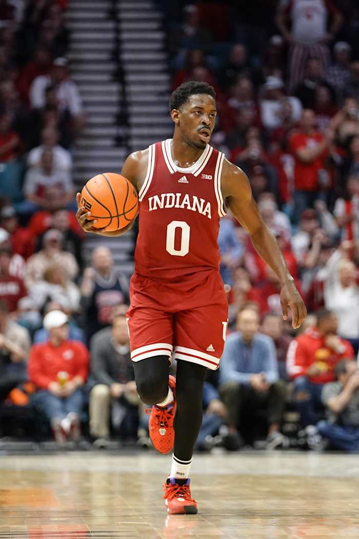 Indiana Hoosiers guard Xavier Johnson (0) handles the ball against the Arizona Wildcats during the second half at MGM Grand Garden Arena
