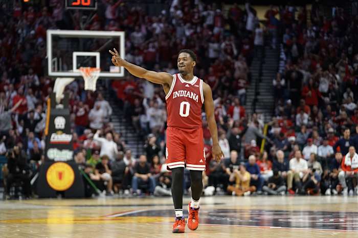 Indiana Hoosiers guard Xavier Johnson (0) reacts after a three point score against the Arizona Wildcats during the second half at MGM Grand Garden Arena.
