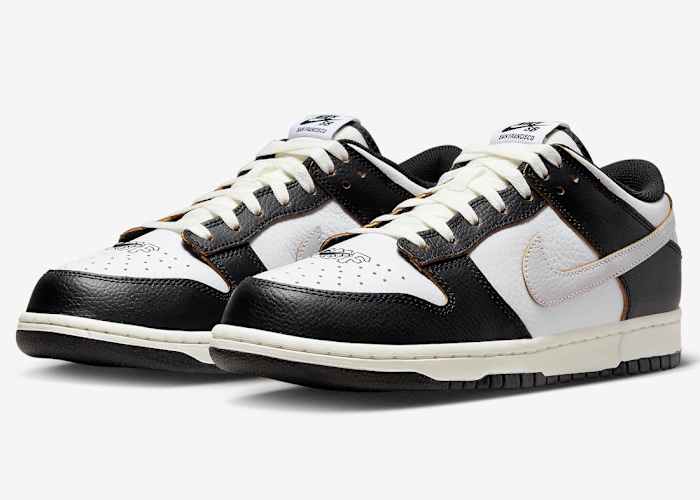 A detailed view of black and white Nike Dunk shoes.