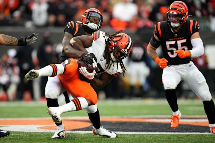 Dec 11, 2022; Cincinnati, Ohio, USA; Cincinnati Bengals linebacker Germaine Pratt (57) tackles Cleveland Browns running back Kareem Hunt (27) in the fourth quarter during a Week 14 NFL game, Sunday, Dec. 11, 2022, at Paycor Stadium in Cincinnati. The Cincinnati Bengals won, 23-10. Mandatory Credit: Kareem Elgazzar-USA TODAY Sports