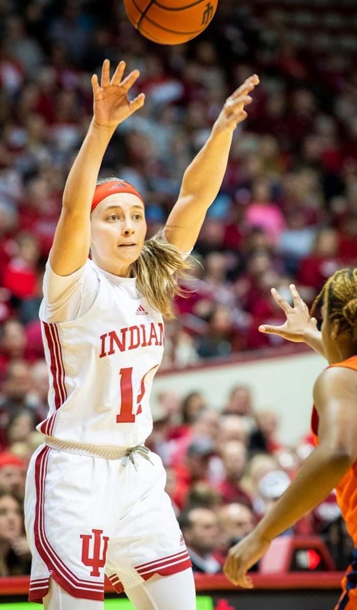 Indiana's Sara Scalia (14) passes during the first half of the Indiana versus Illiniois women's basketball game at Simon Skjodt Assembly Hall on Sunday, Dec. 4, 2022.