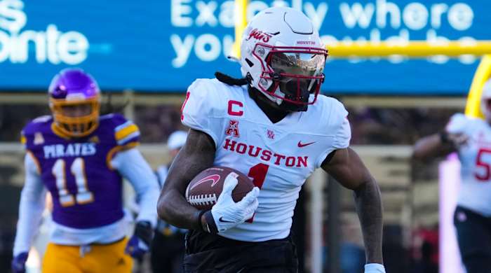 Houston’s Tank Dell runs against East Carolina.