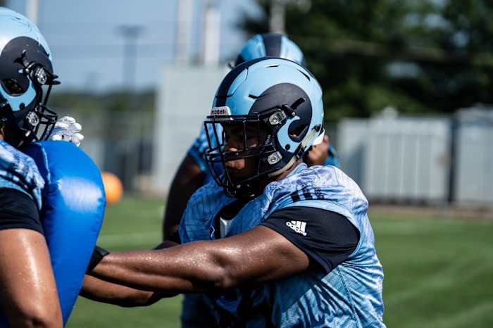 Rhode Island offensive lineman Ajani Cornelius during a practice in 2021.