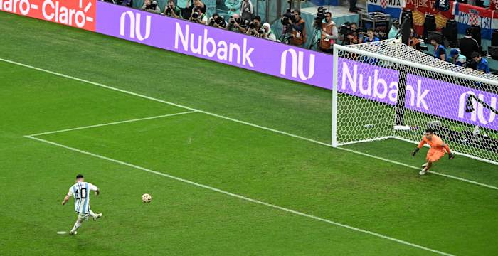 Argentina captain Lionel Messi pictured dispatching a penalty kick past Croatia keeper Dominik Livakovic in the semi-finals of the 2022 World Cup