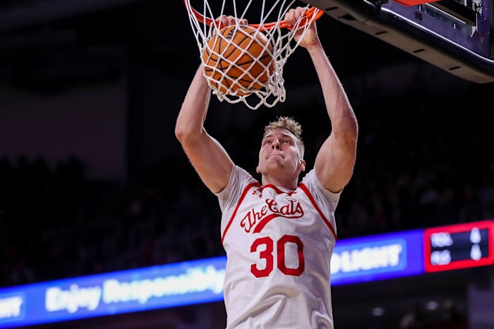 Dec 14, 2022; Cincinnati, Ohio, USA; Cincinnati Bearcats forward Viktor Lakhin (30) dunks on the Miami Redhawks in the first half at Fifth Third Arena. Mandatory Credit: Katie Stratman-USA TODAY Sports