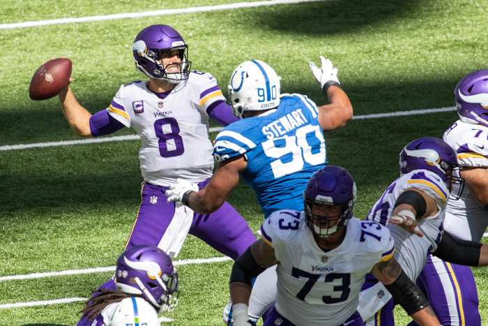 Sep 20, 2020; Indianapolis, Indiana, USA; Minnesota Vikings quarterback Kirk Cousins (8) passes the ball with Indianapolis Colts defensive tackle Grover Stewart (90) defending in the game at Lucas Oil Stadium. Mandatory Credit: Trevor Ruszkowski-USA TODAY Sports