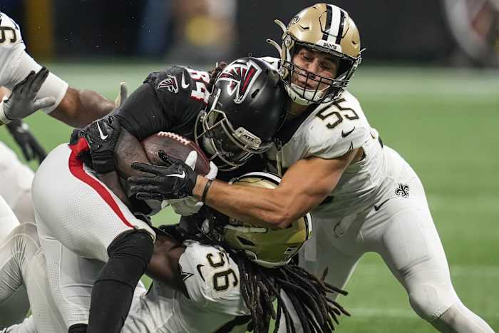 New Orleans Saints linebackers Kaden Elliss (55) and Demario Davis (56) tackle Atlanta Falcons running back Cordarrelle Patterson (84). Mandatory Credit: Dale Zanine-USA TODAY Sports