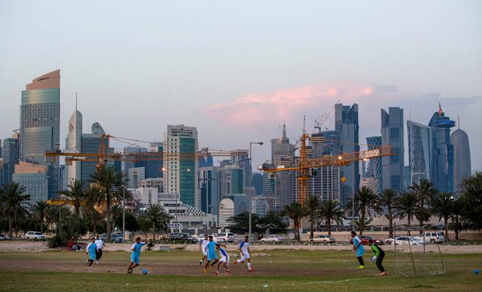 In 2016, as Doha grew behind them, Migrant workers played soccer on the smallest of stages.