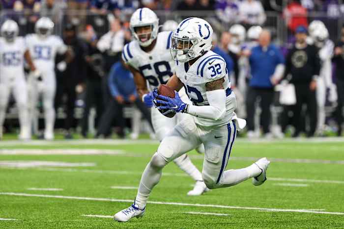 Dec 17, 2022; Minneapolis, Minnesota, USA; Indianapolis Colts safety Julian Blackmon (32) makes an interception against the Minnesota Vikings during the second quarter at U.S. Bank Stadium. Mandatory Credit: Matt Krohn-USA TODAY Sports