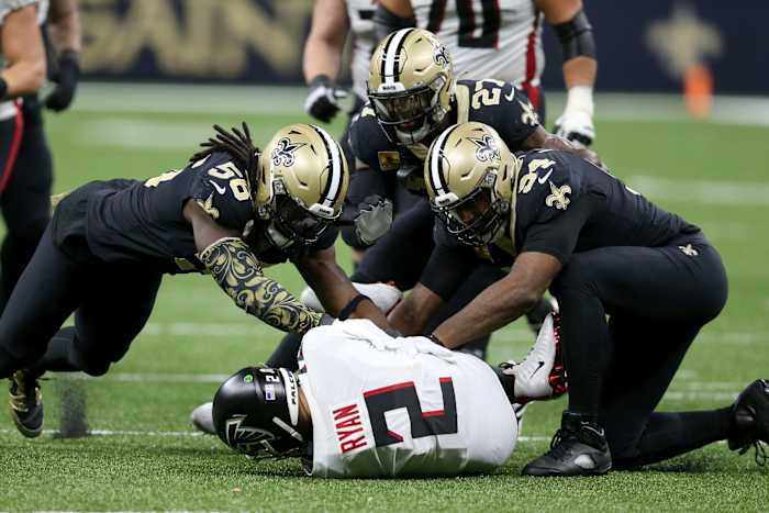 Nov 7, 2021; Atlanta Falcons quarterback Matt Ryan (2) is sacked by linebacker Demario Davis (56) and defensive end Cameron Jordan (94). Mandatory Credit: Chuck Cook-USA TODAY Sports