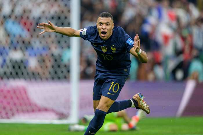 Kylian Mbappe pictured celebrating after scoring his second goal in the 2022 World Cup final