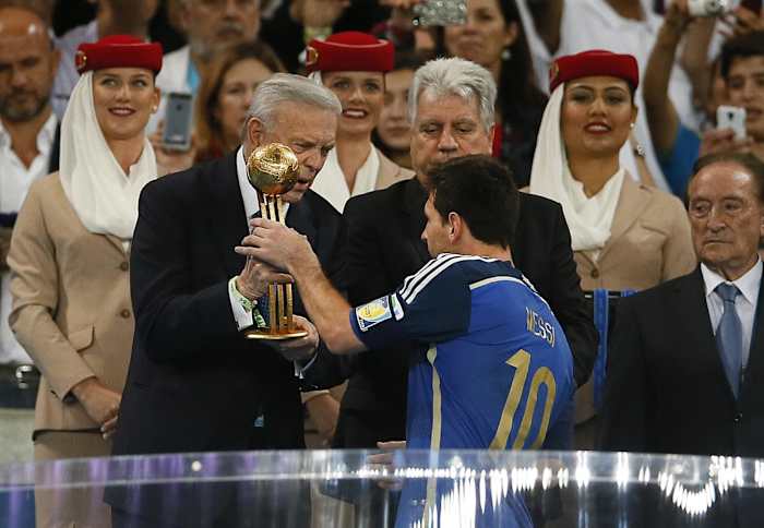 Lionel Messi pictured collecting the Golden Ball trophy after the 2014 FIFA World Cup in Brazil