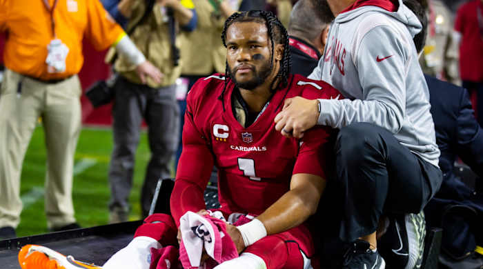Cardinals quarterback Kyler Murray reacts after suffering an injury during a game against the Patriots.