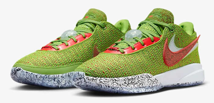 View of green and red Nike LeBron shoes.