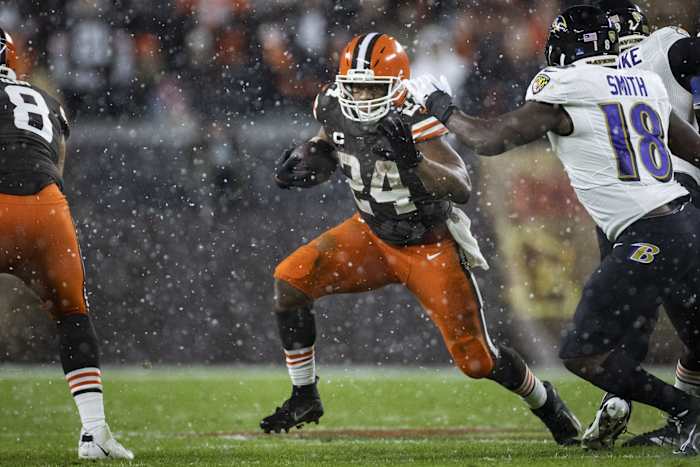 Cleveland Browns running back Nick Chubb (24) runs against the Baltimore Ravens. Mandatory Credit: Scott Galvin-USA TODAY Sports