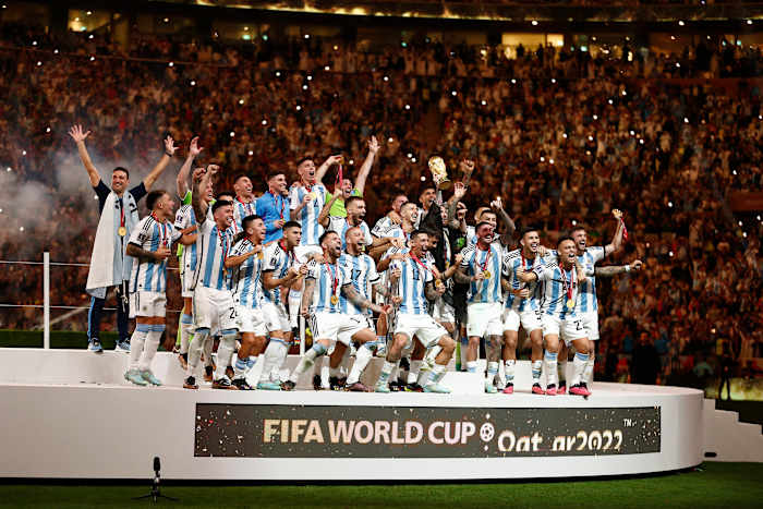 The Argentina team pictured celebrating with their trophy after winning the 2022 FIFA World Cup in Qatar