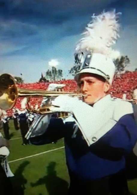 Tori (Cummings) Couch plays the trumpet at the 2011 Rose Bowl as a member of the TCU band. This was a screenshot from her brief appearance on ESPN.
