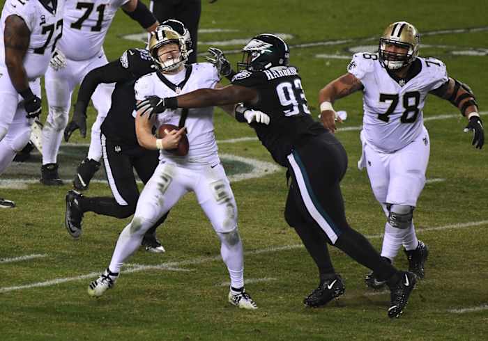 Dec 13, 2020; New Orleans Saints Taysom Hill (7) is tackled by Philadelphia Eagles nose tackle Javon Hargrave (93). Mandatory Credit: James Lang-USA TODAY Sports