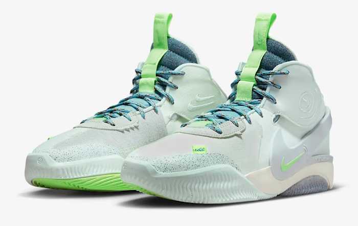 View of green and blue Nike shoes.