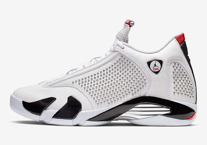 Side view of white and black Jordan shoe.
