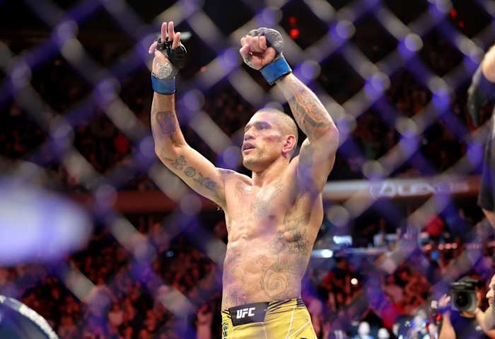 Alex Pereira defeats Israel Adesanya during UFC 281 at Madison Square Garden.