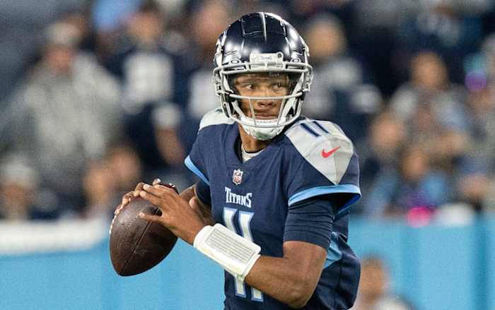 Tennessee Titans quarterback Joshua Dobbs (11) rolls out of the pocket during the second quarter of the game against the Dallas Cowboys at Nissan Stadium Thursday, Dec. 29, 2022, in Nashville, Tenn.