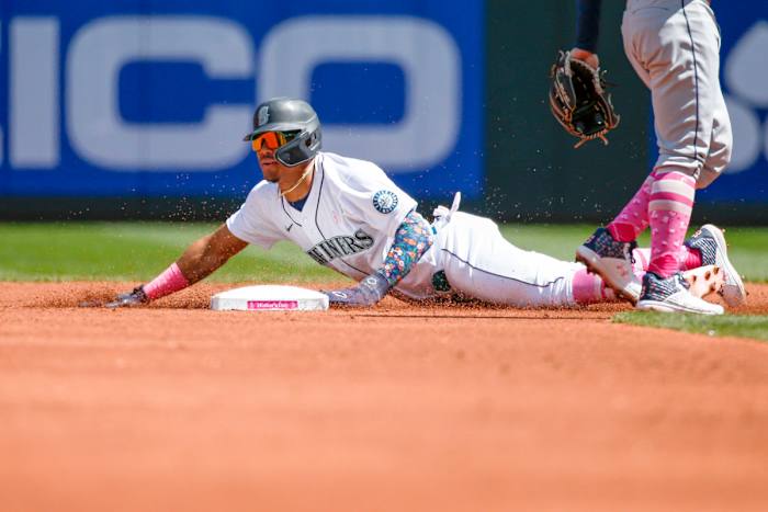 Mariners center fielder Julio Rodriguez steals second base against the Rays during the first inning at T-Mobile Park.
