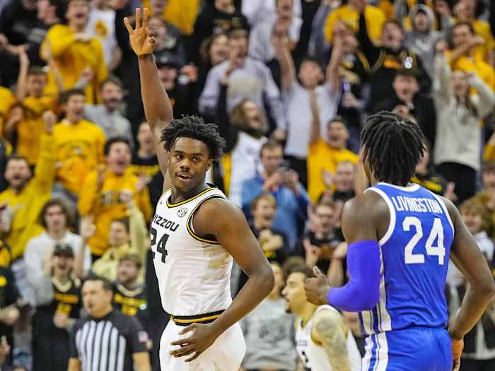 Kobe Brown celebrates a three-pointer