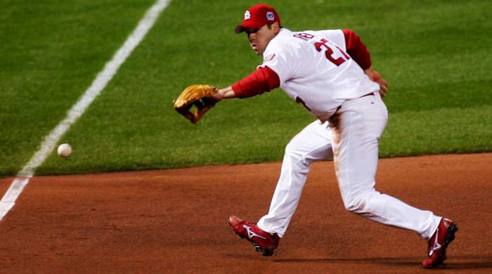 Cardinals third baseman Scott Rolen fields a groundball during the 5th inning of Game 4 of the 2006 World Series against the Tigers at Busch Stadium in St. Louis.