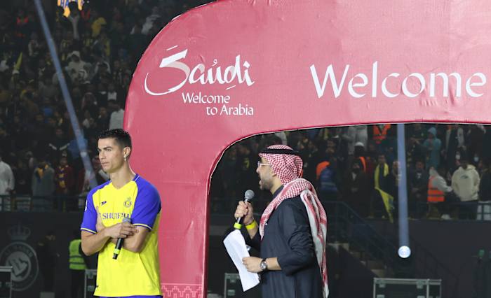 Cristiano Ronaldo pictured (left) during his official unveiling as an Al Nassr player in January 2023