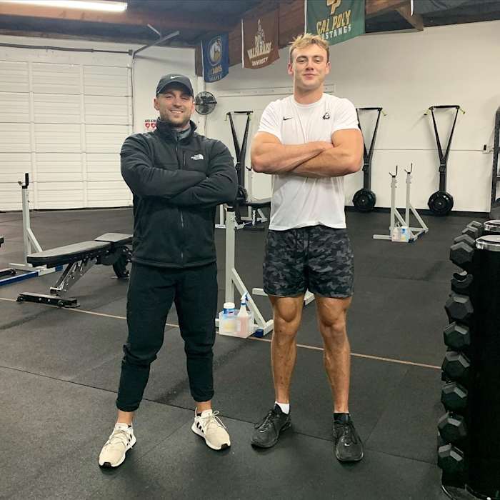 Brock Bowers with his personal trainer John Cortese.