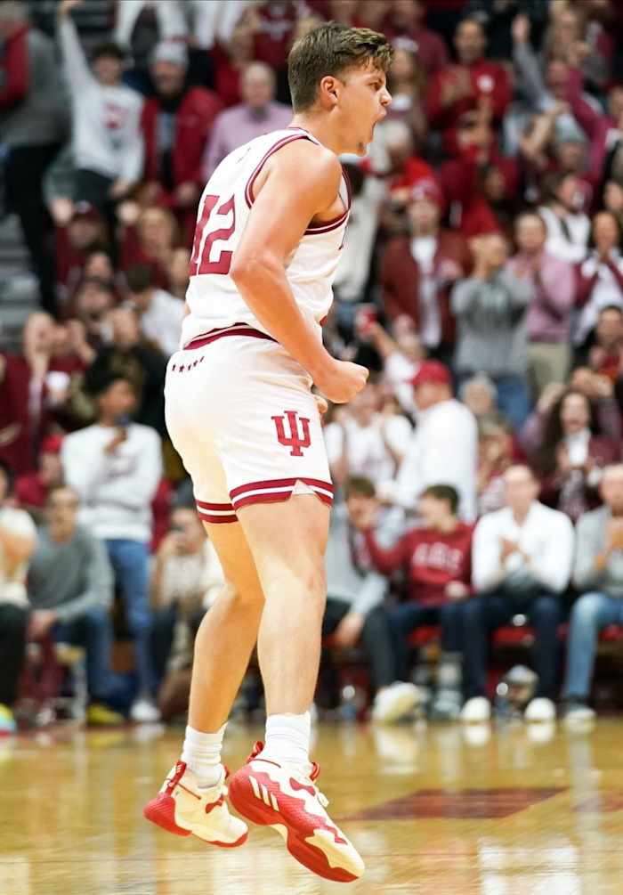 Indiana Hoosiers forward Miller Kopp (12) celebrates after a play against the Northwestern Wildcats during the first half at Simon Skjodt Assembly Hall.