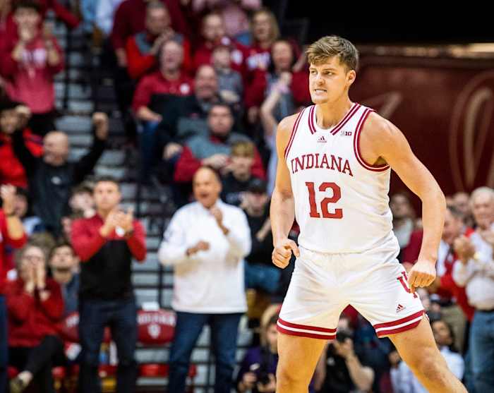 Indiana's Miller Kopp (12) reacts after making a three-pointer during the first half ot the Indiana versus Northwestern men's basketball game at Simon Skjodt Assembly Hall on Sunday, Jan. 8, 2023.