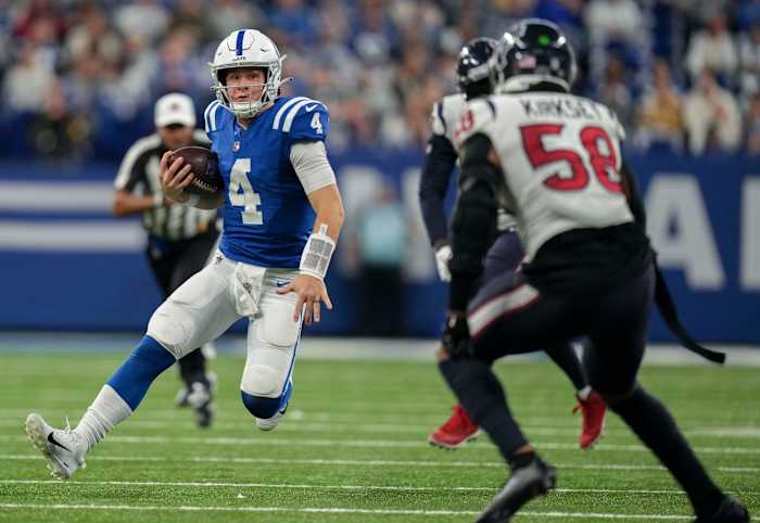 Indianapolis Colts quarterback Sam Ehlinger (4) rushes the ball Sunday, Jan. 8, 2023, during a game against the Houston Texans at Lucas Oil Stadium in Indianapolis.