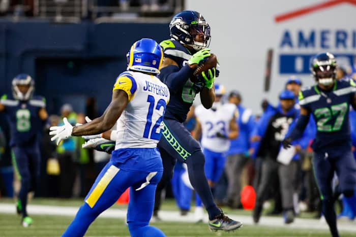 Seattle Seahawks safety Quandre Diggs (6) intercepts a pass intended for Los Angeles Rams wide receiver Van Jefferson (12) during overtime at Lumen Field.