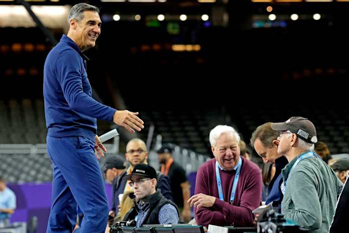 Villanova Wildcats head coach Jay Wright speaks with CBS announcers Jim Nantz and Bill Raftery