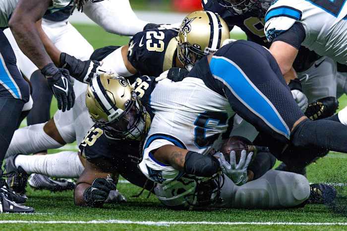 New Orleans Saints defensive tackle David Onyemata (93) tackles Carolina Panthers running back D'Onta Foreman (33). Mandatory Credit: Stephen Lew-USA TODAY Sports