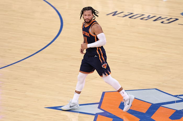 Jalen Brunson runs down the court.